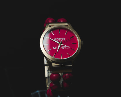 Positive Empathetic's Matte Gold Beaded Watch, 38mm riverstone red dial — bracelet stone detail