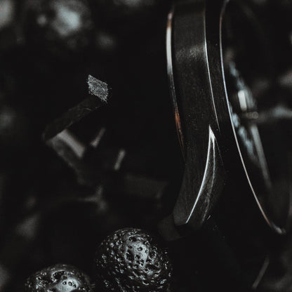 Positive Empathetic's Matte Black Beaded Watch, 38mm lava rock bracelet — clasp and caseback detail