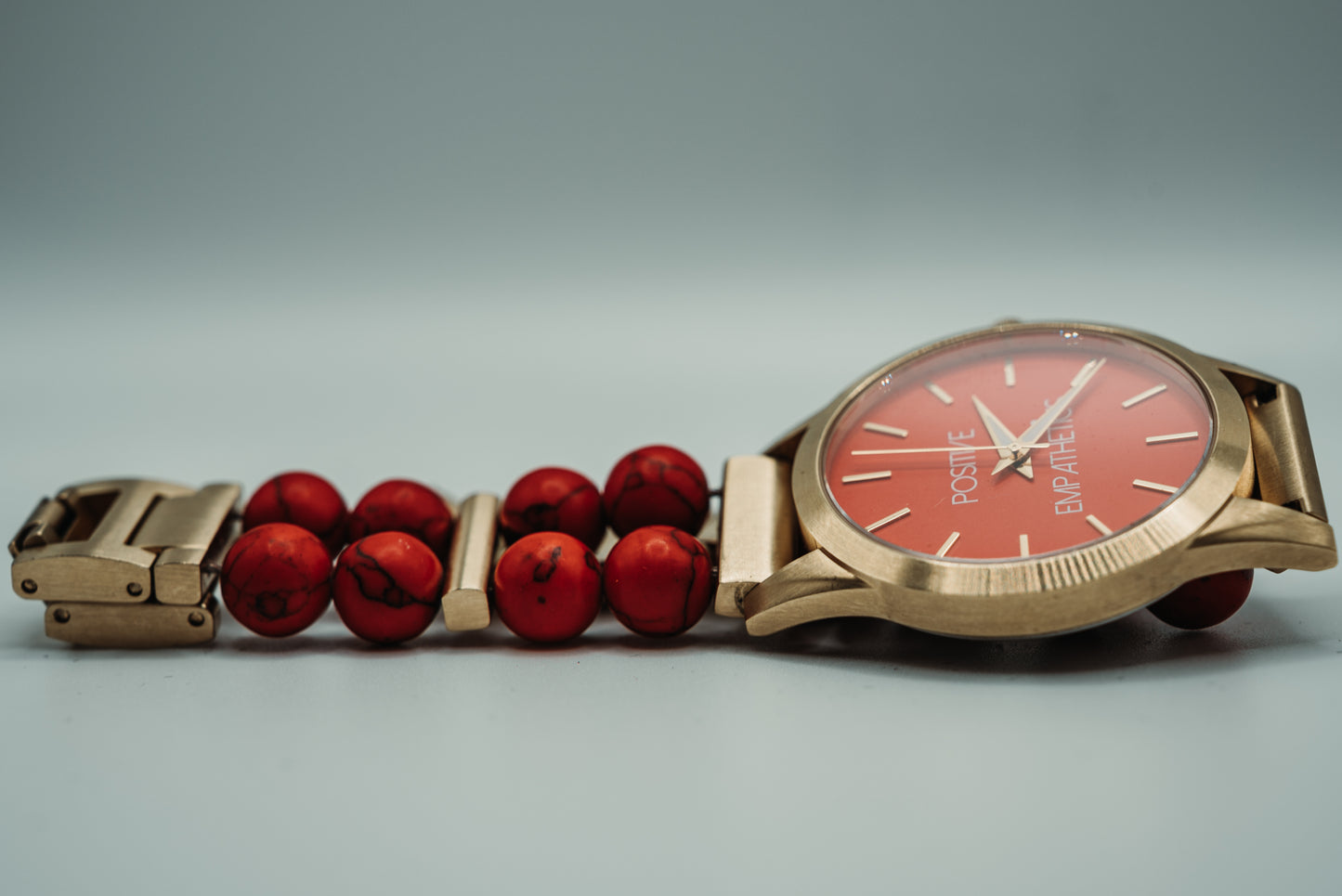 Gold / Riverstone Red
